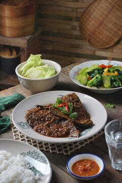 Malay dish situation Hati Lembu Masak Jintan and Kailan Goreng