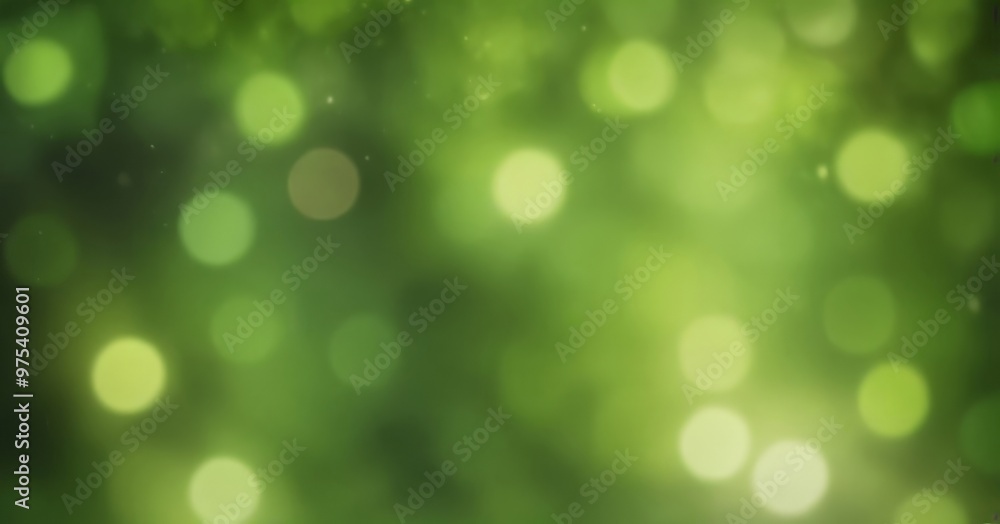 Poster a blurred, green background with numerous small, circular lights scattered throughout, creating a bo