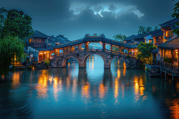 Naklejka premium Chinese ancient town at night, ancient stone bridges and residential buildings