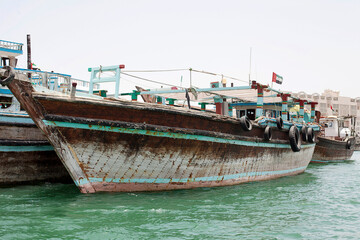 Fototapeta premium Dhows, traditional trading vessels at Dubai Creek, Dubai