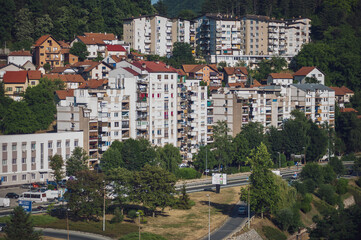 View of the small town with high-rise buildings and streets