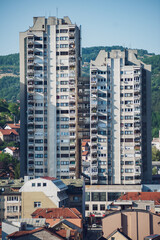 View of the small town with high-rise buildings and streets