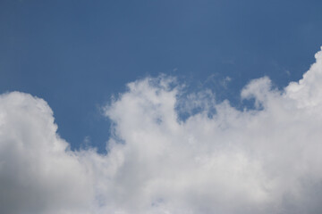 Obraz premium Clouds on the blue sky nature with space background wallpaper