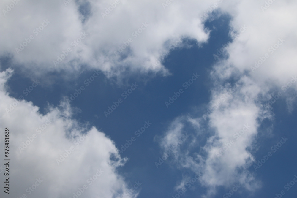 Sticker clouds on the blue sky nature with space background wallpaper