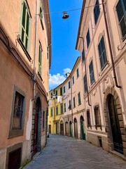 Characteristic, cobblestone streets of Pontremoli in northern Tuscany,  Colourful buildings and no people. 