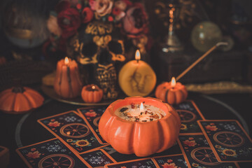 Mystical scene with candles. Fate prediction. Halloween concept, details and décor for home