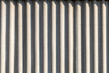 slate. texture of a corrugated sheet in the bright autumn sun. there is tinting