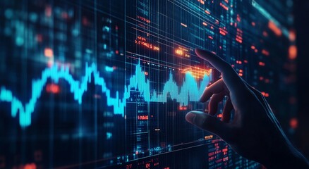 Fototapeta premium A hand interacts with a digital stock market graph, symbolizing technology and finance in modern data analysis.