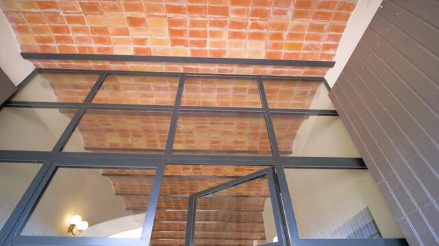 Slow tilting shot of an antique dining area within a villa in Goult, France