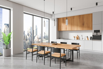Luxury home kitchen interior with dining table and cabinet, panoramic window