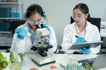 Team Microbiologists Analyzing Molecular Samples in Advanced Food Science Laboratory, Dietitian...