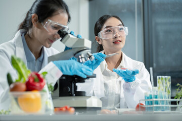 Team Microbiologists Analyzing Molecular Samples in Advanced Food Science Laboratory, Dietitian...