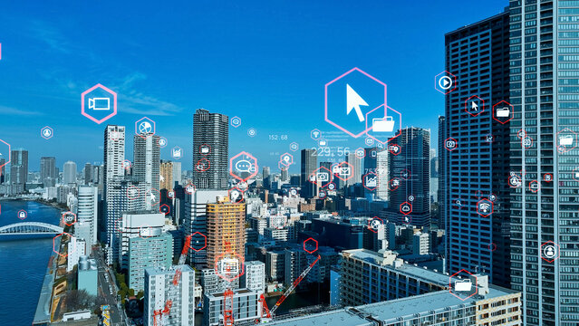 Mixed media of modern city aerial view and digital technology concept.