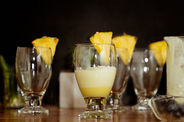 Refreshing piñacolada cocktails with black background. Copy space. Black friday.