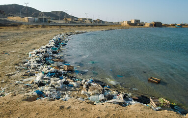 Environment of the Red Sea,  Mountains of garbage on the beach away from the resort towns of Marsa Alam, Egypt