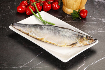 Whole raw salted herring fish