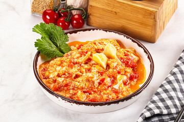 Shakshuka with tomato for breakfast
