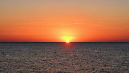 Obraz premium sunset on the beach in the caribbean sea