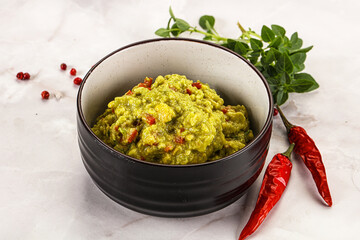 Guacamole with avocado, tomato and chili