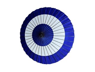Fototapeta premium The picture shows an ancient Japanese umbrella with a circular shape, dark blue outside, white inside, and a dark blue innermost part. It has a wooden structure painted black.