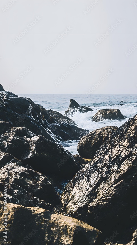 Canvas Prints Rocky coastline with crashing waves in the distance.