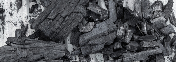 surface of charcoal texture background. a porous black solid, consisting of an amorphous form of...