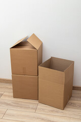 Three large cardboard boxes. Vertical. Packing after moving or delivery