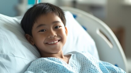 Central Asian Boy Smiling While Lying in Hospital Bed Wearing Patient Gown, Healthcare and Recovery Scene