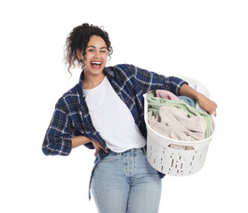 Happy woman with basket full of laundry on white background