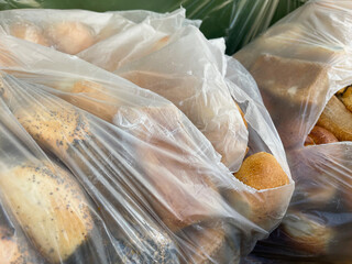 bread from bakery in garbage bin