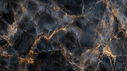 A dark marble surface with bold, natural veining patterns, providing a luxurious and timeless texture for a sleek background