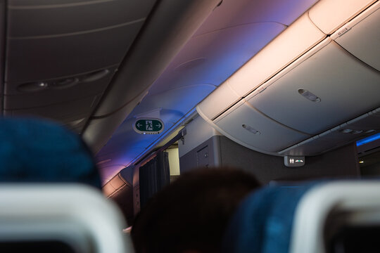 Interior view of an airplane cabin during flight