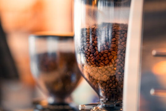 Roasted coffee beans in a glass container