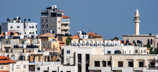Skyline of the capital of Palestine, Ramallah, with buildings and a minaret