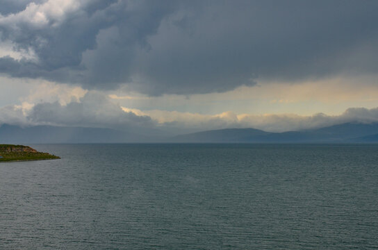 stormy clouds over Sevan lake scenic view from Hayravank monastery (Gegharkunik Province, Armenia)   