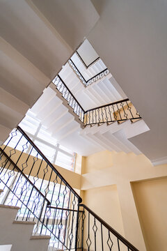 Elegant spiral staircase captured from the bottom