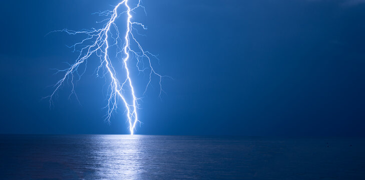 Lightning strike on the Black Sea during stormy night