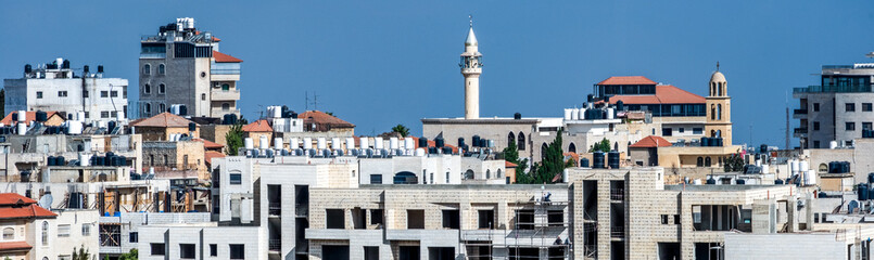 Skyline of the capital of Palestine, Ramallah, with buildings and a minaret
