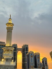 Obraz premium The minaret of the Grand Mosque with the golden crescent. The crescent is covered with gold-plated glass that looks magnificent, the height of the minaret of the Grand Mosque is more than 130 meters, 