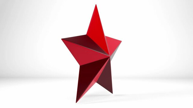 A red star rotating on a white background