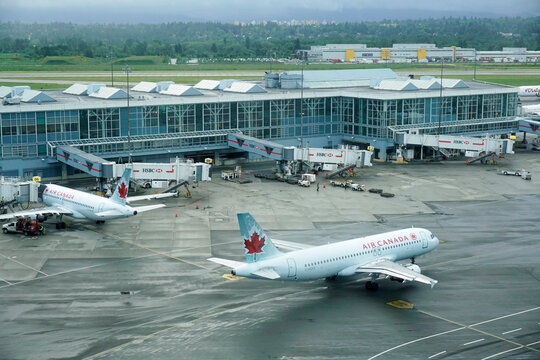An Air Canada aircraft on the tarmac at Vancouver airport , British Columbia, Canada
