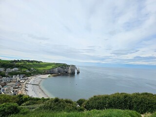 Normandy, France - May 18, 2024: Picturesque panoramic landscape on the cliffs of Etretat. Natural amazing cliffs. Etretat, Normandy, France, La Manche or English Channel. Coast of the Pays de Caux ar