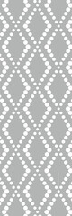 A repeating pattern featuring white dots and diamonds on a gray background, suitable for wallpaper or textile design.