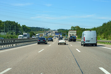 Automobile traffic of vehicles on a motorway.