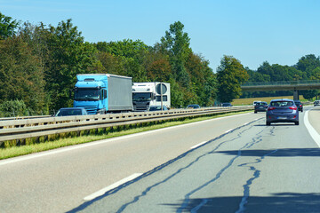 Automobile traffic of vehicles on a motorway.