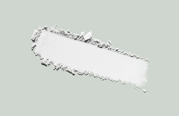 Eye shadow or white cosmetic pressed or loose powder matte white colored texture swatch isolated on...