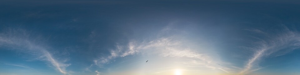 360 panorama of glowing sunset sky with bright Cirrus clouds. HDR 360 seamless spherical panorama. Full zenith or sky dome sky replacement for aerial drone panoramas. Climate and weather change.