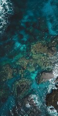 Aerial View of Clear Ocean Water with Rocks