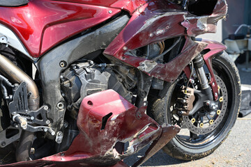 Damaged sports motorcycle after a fall at a race