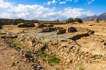 Ruins of the monastery, the town, and the ancient medieval walls of Roses, Spain, inside the citadel